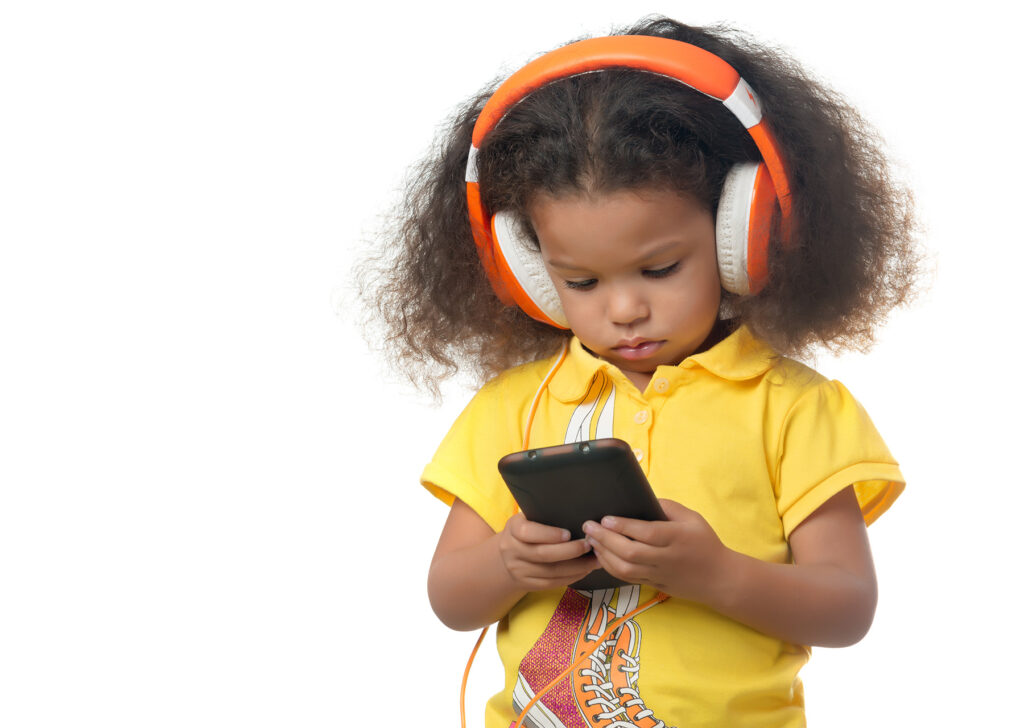 small girl listening to music